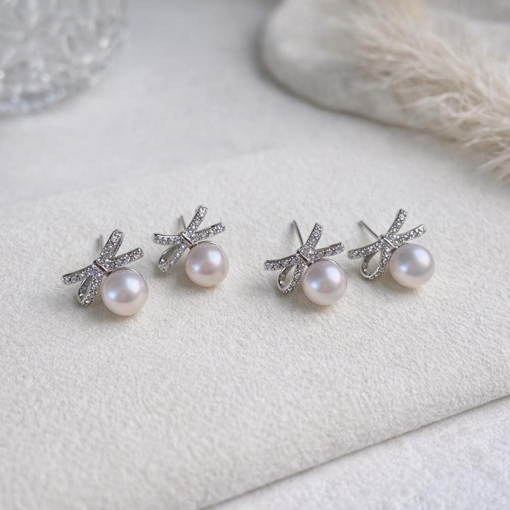 Natural Freshwater Aurora Pearl Bow Stud Earrings