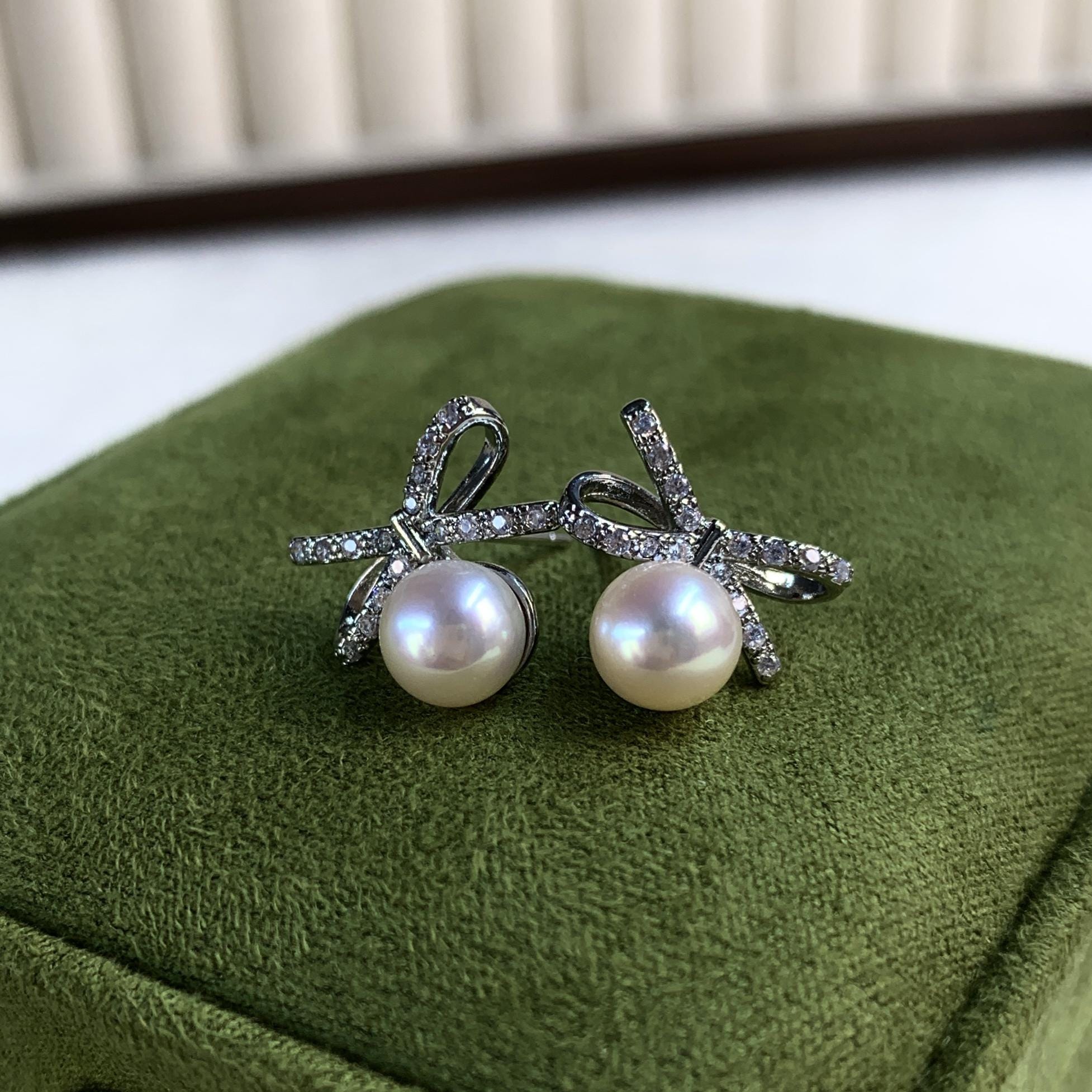 Natural Freshwater Aurora Pearl Bow Stud Earrings