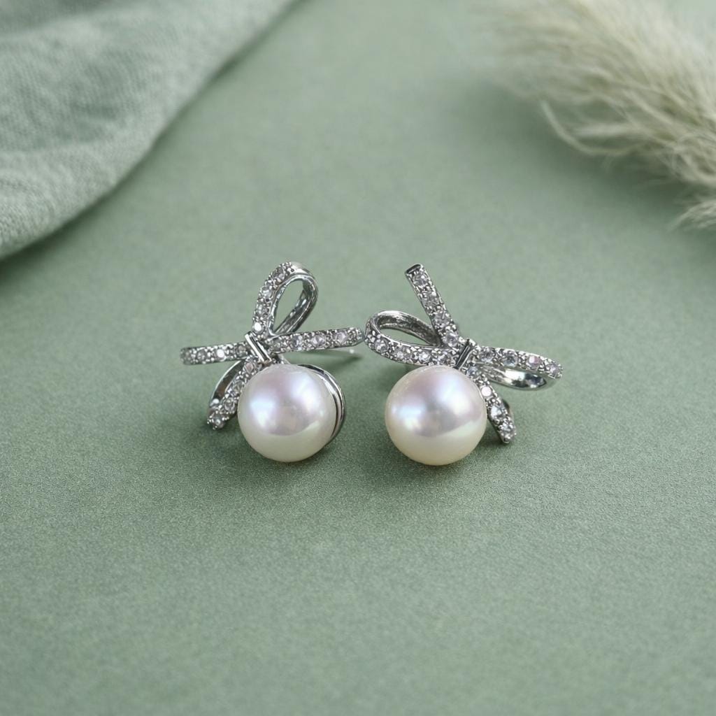 Natural Freshwater Aurora Pearl Bow Stud Earrings